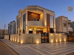 Luxury villa for sale in Al Yasmin with a modern design and high-end finishes, including air conditi
