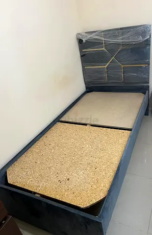 Single bed frame with upholstered headboard