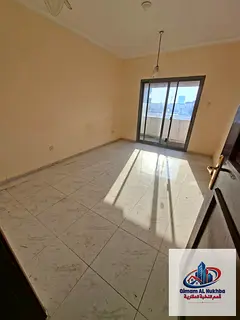 Beautiful 3-bedroom apartment with a living room and balcony in Al Majaz. Spacious layout, well-orga