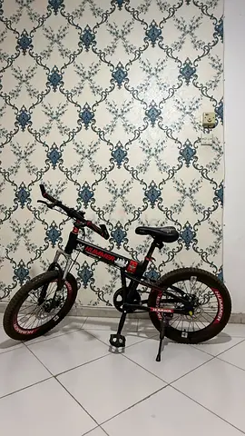 Used black/red kids' BMX style bicycle - good working condition