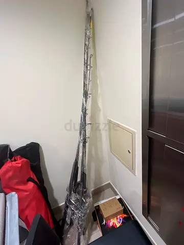 Long metal curtain pole/rod with rings - like new
