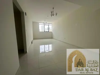 Two-bedroom apartment with a living room in Al Taawun area | 3 bathrooms | Free parking | 15 free days on the first lease | Balcony with an open view