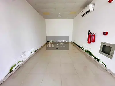 Spacious 450 Sq. Ft. Shop for Rent – Hoshi, Sharjah Roadside Building | Front of Main Road | AED 33,000 Annual Rent