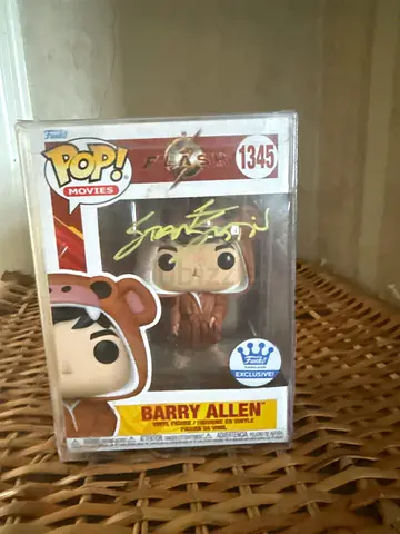 Signed funko pop signed by  Grant Gustin