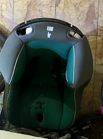 Used infant car seat - green, needs cleaning