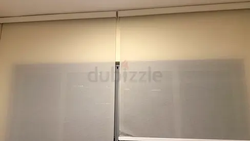 Pair of white fabric roller blinds - good condition
