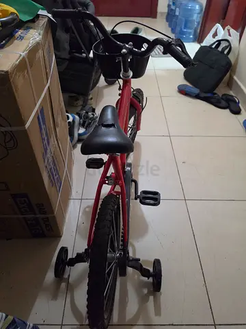 Kids' training bike with stabiliser wheels -good working condition, Damaged seats, repair required
