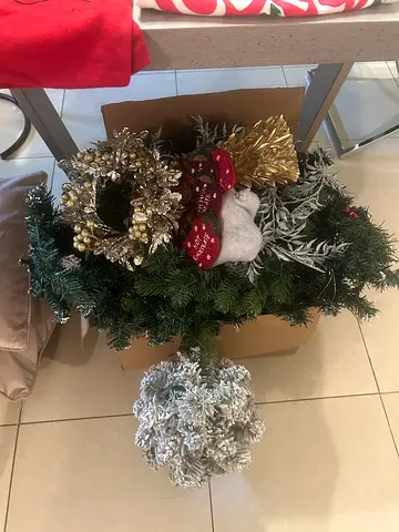 Christmas wreaths and tabletop snowy decoration lights and garlands - used set