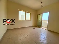 Two bedrooms and a living room for annual rent in Al Rashidiya 3 | Prime location opposite the Ladie