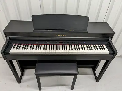 Yamaha Clavinova CLP 430 piano with bench. As good as new. Cash on free delivery with warranty.