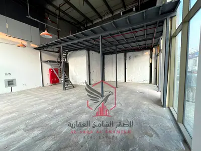 Two-floor commercial shop with spacious areas, free parking, prime location near all services, and easy truck access.