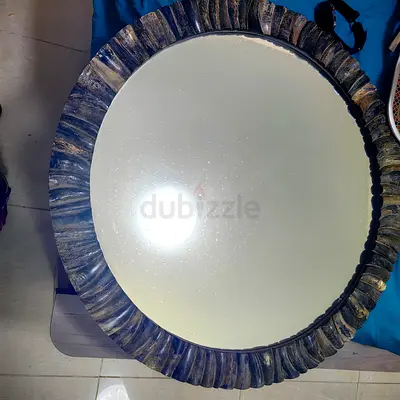 Round vintage Decorative Wall Mirror with Textured Wooden Frame