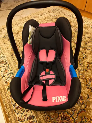 Pixie infant car seat / baby carrier - pink (excellent used condition)