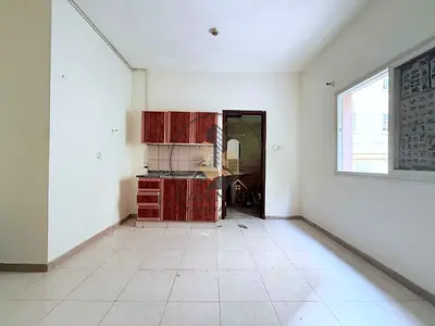 SPACIOUS STUDIO | FITTED CABINETS KITCHEN | CHEAPEST PRICE | FAMILY BUILDING | EASY ACCESS TO DUBAI