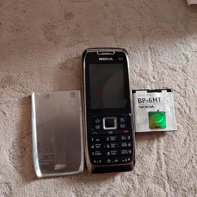 Nokia E51 classic mobile phone with spare BP-6MT battery