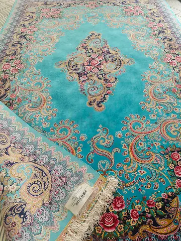 2 Iranian carpets 100% silk hand and machine made