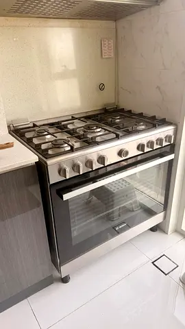 Stainless Steel 5-Burner Gas Range with Oven - Very Good Condition (under warranty)