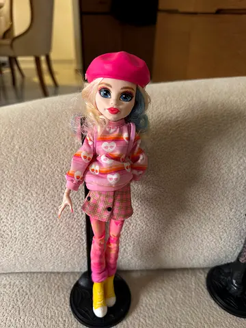 Bratz-style fashion doll in pink outfit - good preowned condition