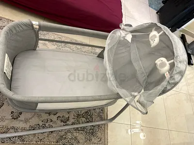 Light grey baby bassinet/cradle with canopy