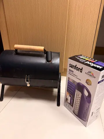 Portable charcoal mini grill with lid and legs - use once