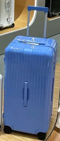 Trunk plus blue luggage