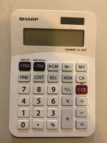 Sharp EL-330F Compact Solar Calculator - Used