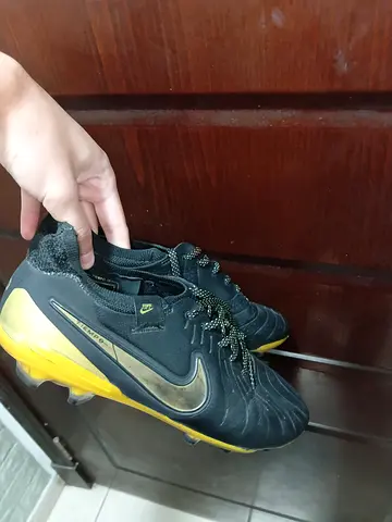 Used Nike black & gold football boots — size 41