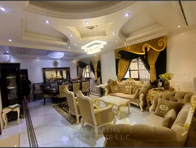 # Villa for sale in Al Muwaihat 1 | 5 master bedrooms | 2 living rooms | Large yard | Electricity, water, and air conditioning included