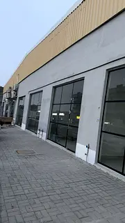 Brand-New Showroom | 900 Ground + 600 Mezzanine | 1,500 sqft Total | 13 kW | Ajman Industrial 1 | AE