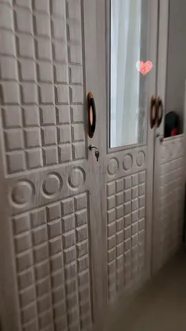 Bed and cupboard