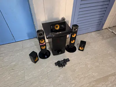 LG 5.1ch (850 Watts ,Bluetooth, Optical in, Aux) Dolby Home Theatre System in excellent working