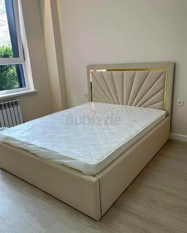 Beige Fabric Double Bed with Padded Headboard and Gold Trim
