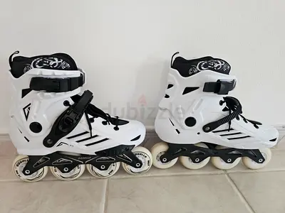 Pair of white adjustable inline skates - size approx. 38-41