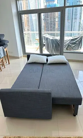 IKEA L shap Sofa store cum bed you can fix the storage lift or Right any side