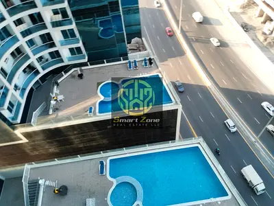 Spacious 2 BHK for Rent in Oasis Tower, Ajman | Full Sea View & Covered Parking