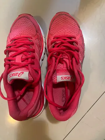 Pink ASICS running shoes - used, size not specified