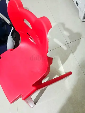 Red plastic baby chair / toddler seat in good used condition