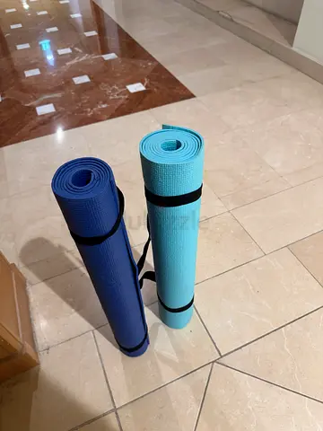 Two yoga mats with carry straps - good condition