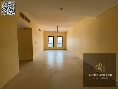 Large 2BR Hall in Al Hamidiya 1 near Ajman Court, two master bedrooms, 3 bathrooms, balcony, built‑in wardrobes and very big kitchen, yearly rent AED