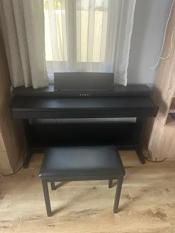 Black digital piano with bench - good condition kawai