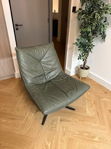 Green leather swivel lounge chair - modern design