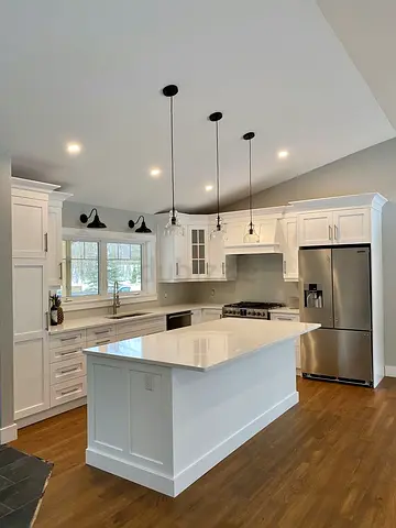 Modern White Kitchen with Island and Pendant Lights
