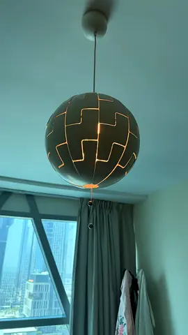 Modern spherical pendant lamp with geometric cutouts - white