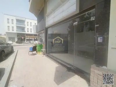 محل تجاري بموقع حيوى ومساحة ممتازة يصلح لإضافة ميزانين للإيجار السنوي على شارع الخرطوم في الروضة 3، عجمان – تسهيلات على 4 دفعات!  فرصة استثمارية وتجار
