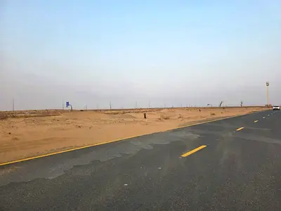 Residential land for sale in Sharjah - Rawdat Al Qurt area - Al Ruwaidat suburb