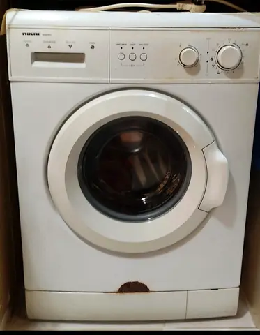 Used front-load washing machine - compact, needs repair