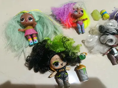 Bundle of 5 LOL Surprise Dolls — mixed condition, some hair messy