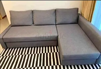Grey L-shaped Sofa bed with Storage — Good Condition