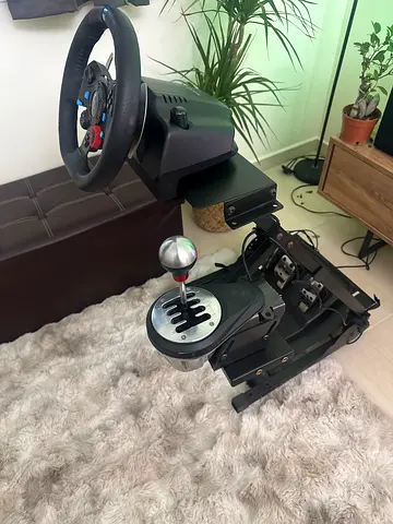 Logitech racing wheel setup with pedals and shifter mount (stand included)