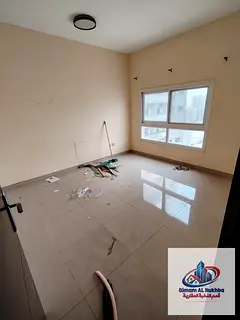 1BR in Al Qasimia Bu Danig behind Mega Mall, large kitchen, central AC, bathroom and free parking. A